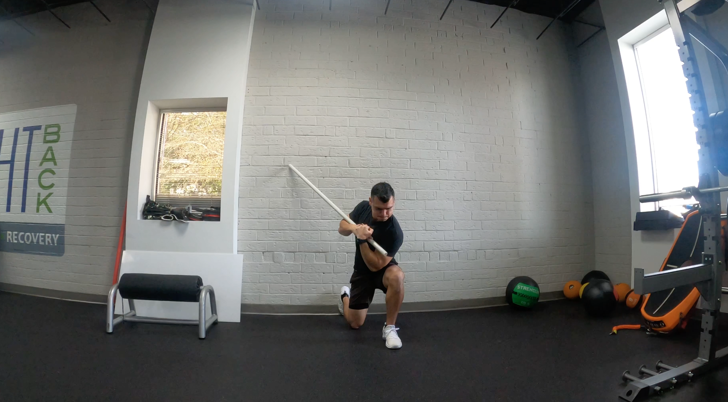 How a Split Squat with Rotation Improves Your Swing